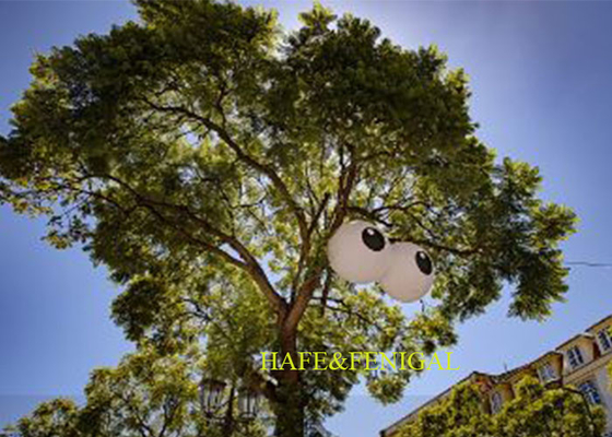 Inflatable Eyes Balloons Hanging In Trees With Built-In Fan Or Air-Sealed Design