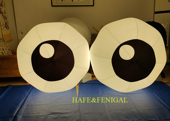 Inflatable Eyes Balloons Hanging In Trees With Built-In Fan Or Air-Sealed Design